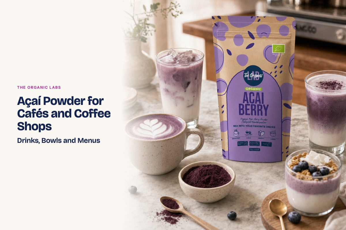 Açaí powder pack with hot and iced lattes on a café counter