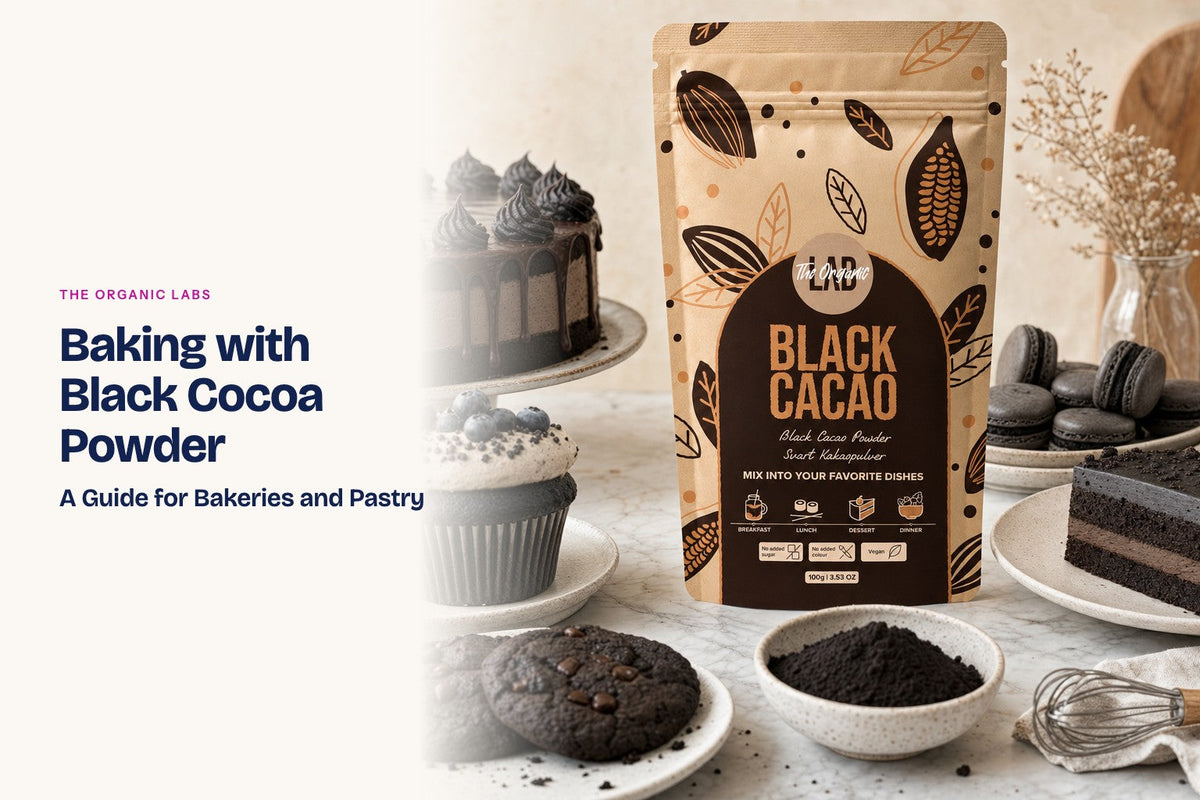 Black cocoa powder pack with cakes, cupcakes and macarons