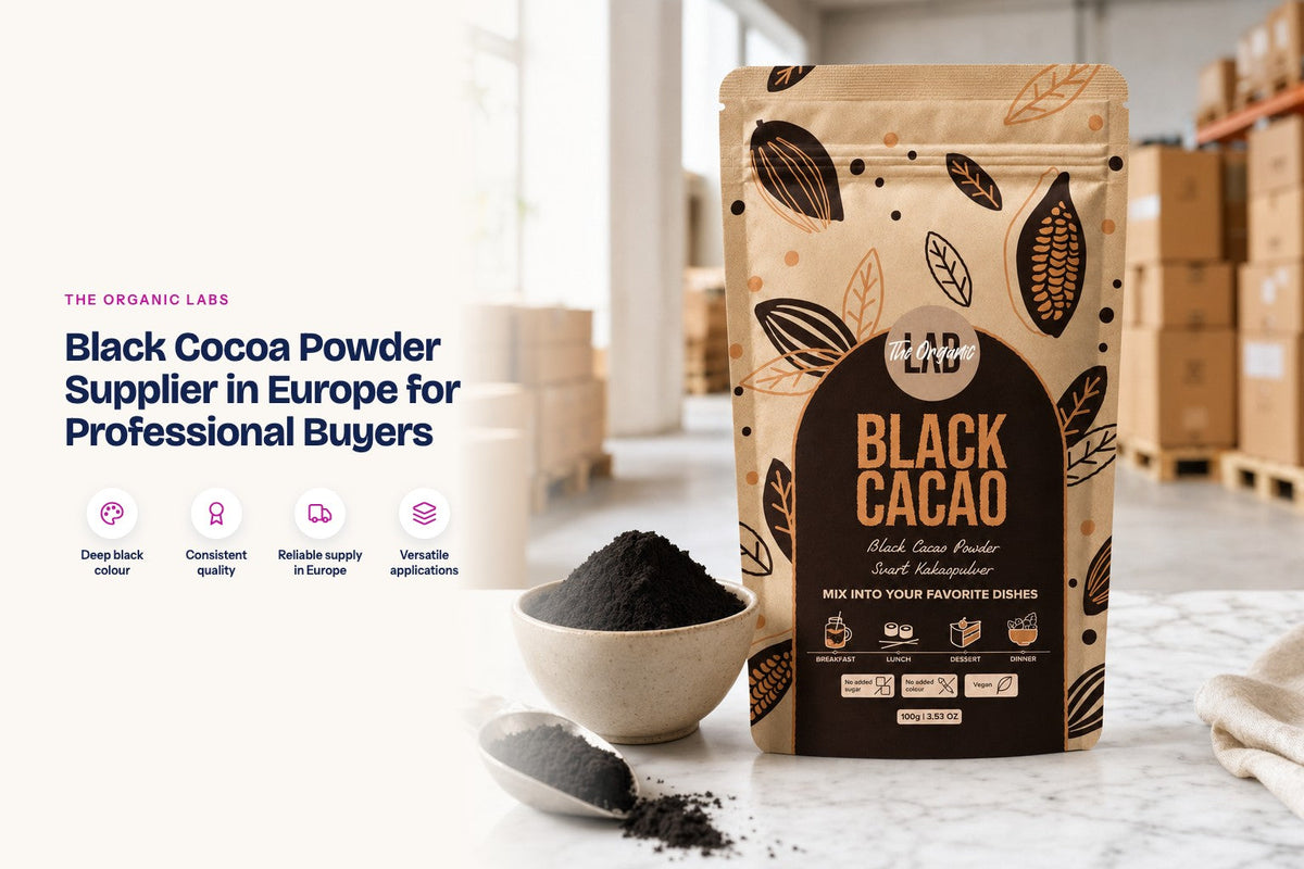 Black cocoa powder pack with a 25 kg bulk drum in a warehouse