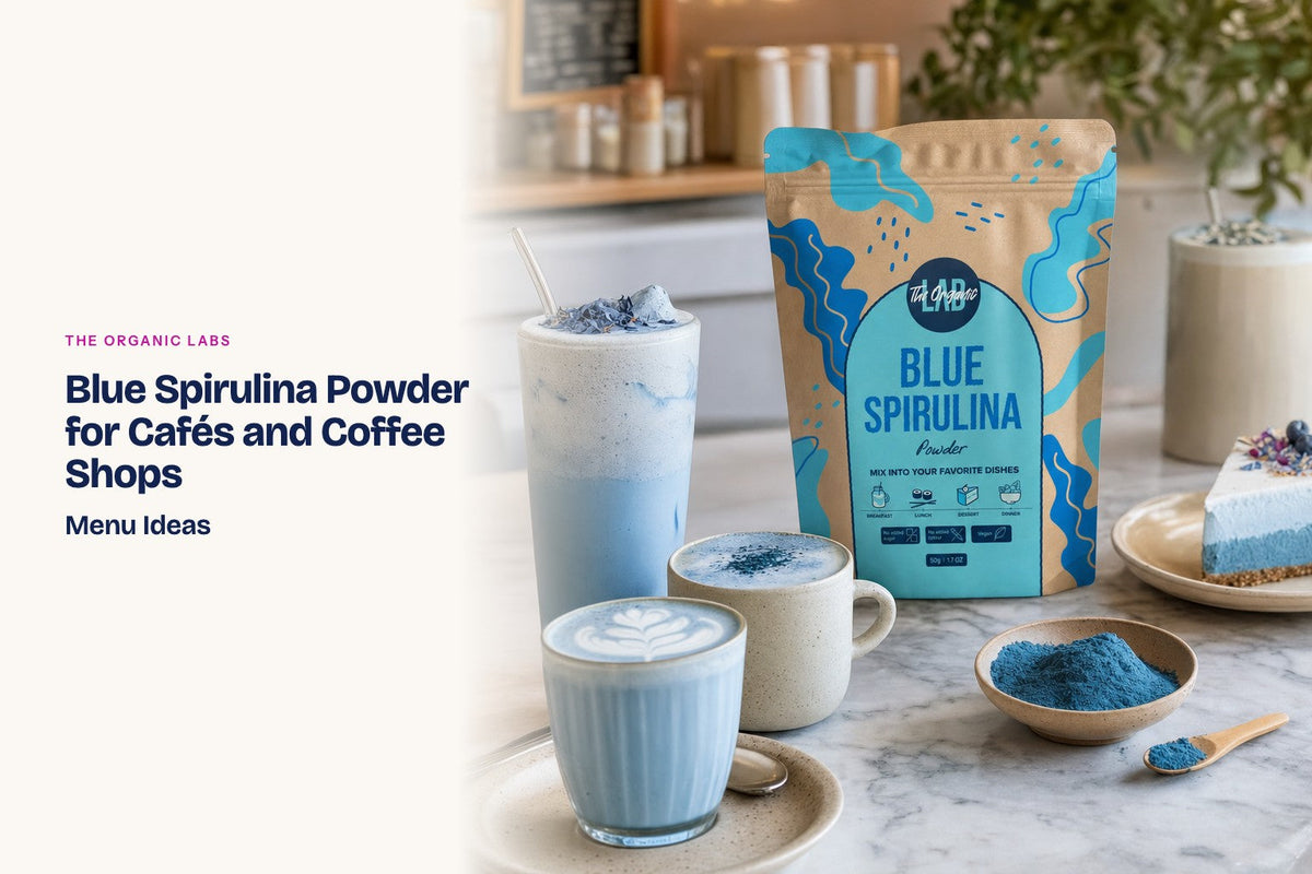 Blue spirulina powder pack with hot and iced lattes on a café counter