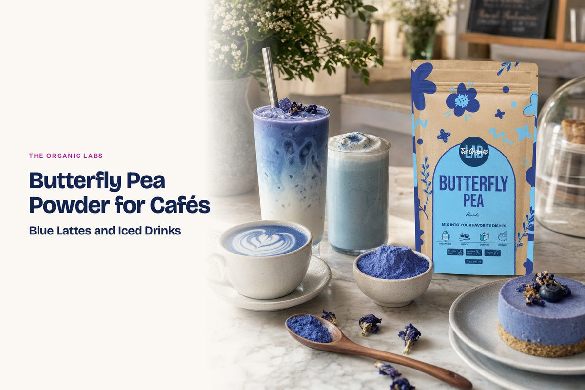 Butterfly pea powder pack with hot and iced lattes on a café counter
