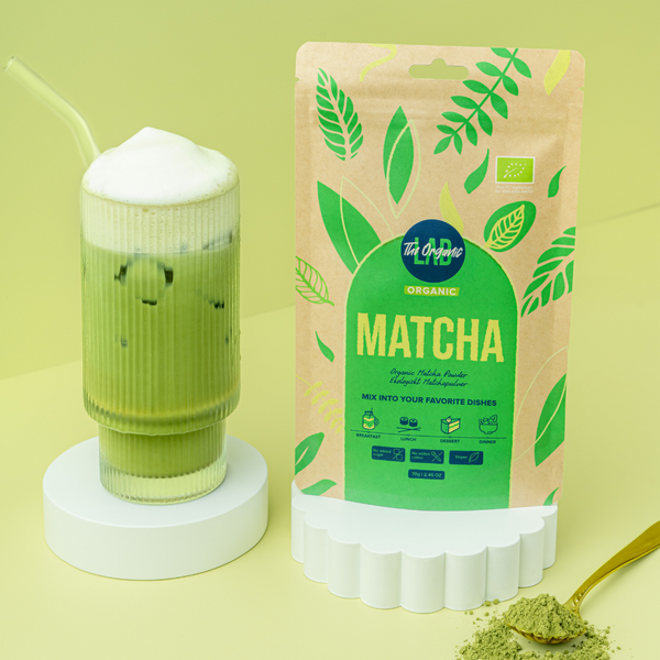 Iced organic matcha latte with milk foam
