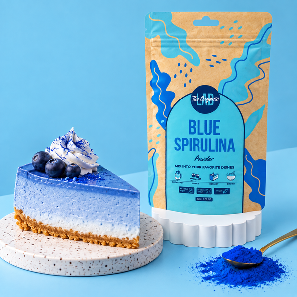 Blue spirulina cheesecake topped with blueberries