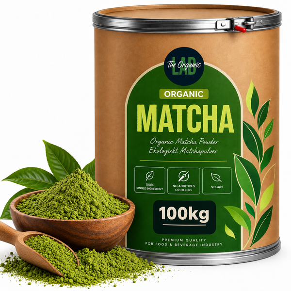 Bulk organic matcha powder in a 100 kg drum with fresh green tea leaves