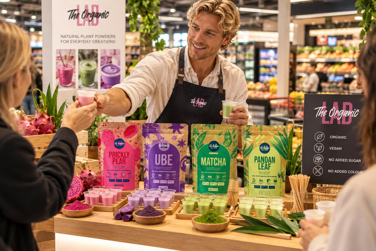 Serving superfood drink samples to café and HoReCa buyers at The Organic Labs stand