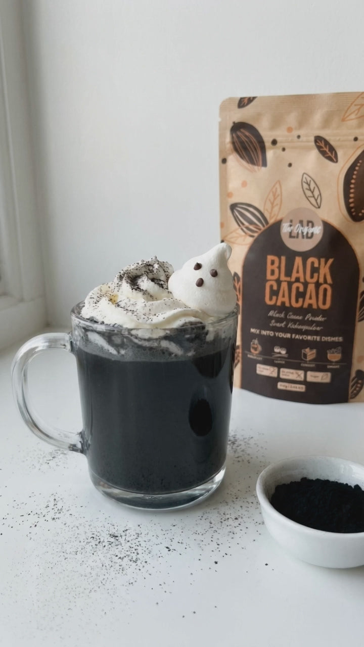 Black hot chocolate with whipped cream made with Black Cocoa Powder